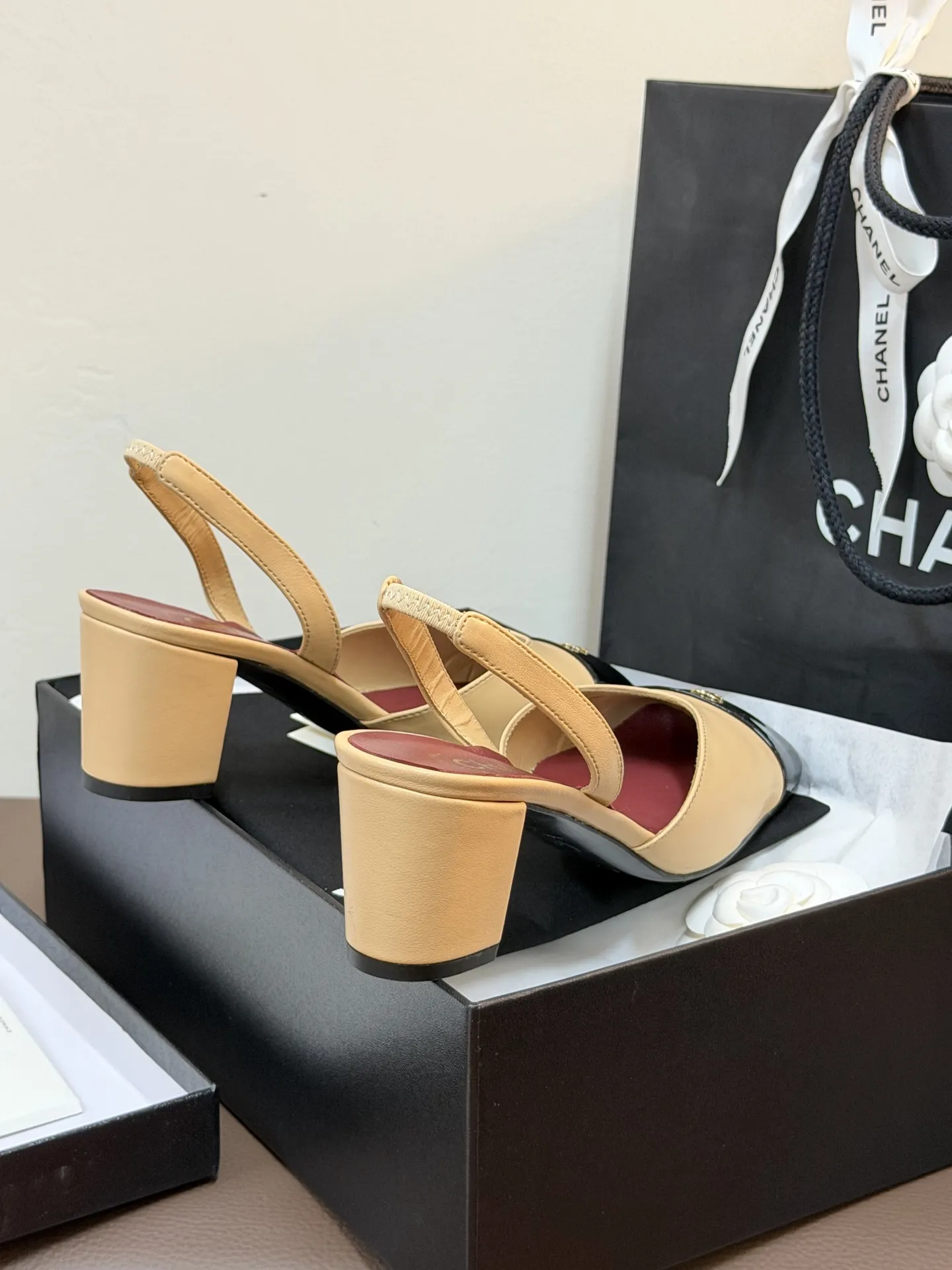 Chanel 1:1 premium Slingback pumps in beige-black, all-black, and white-gold two-tone lambskin with boutique packaging - xiashuluxe