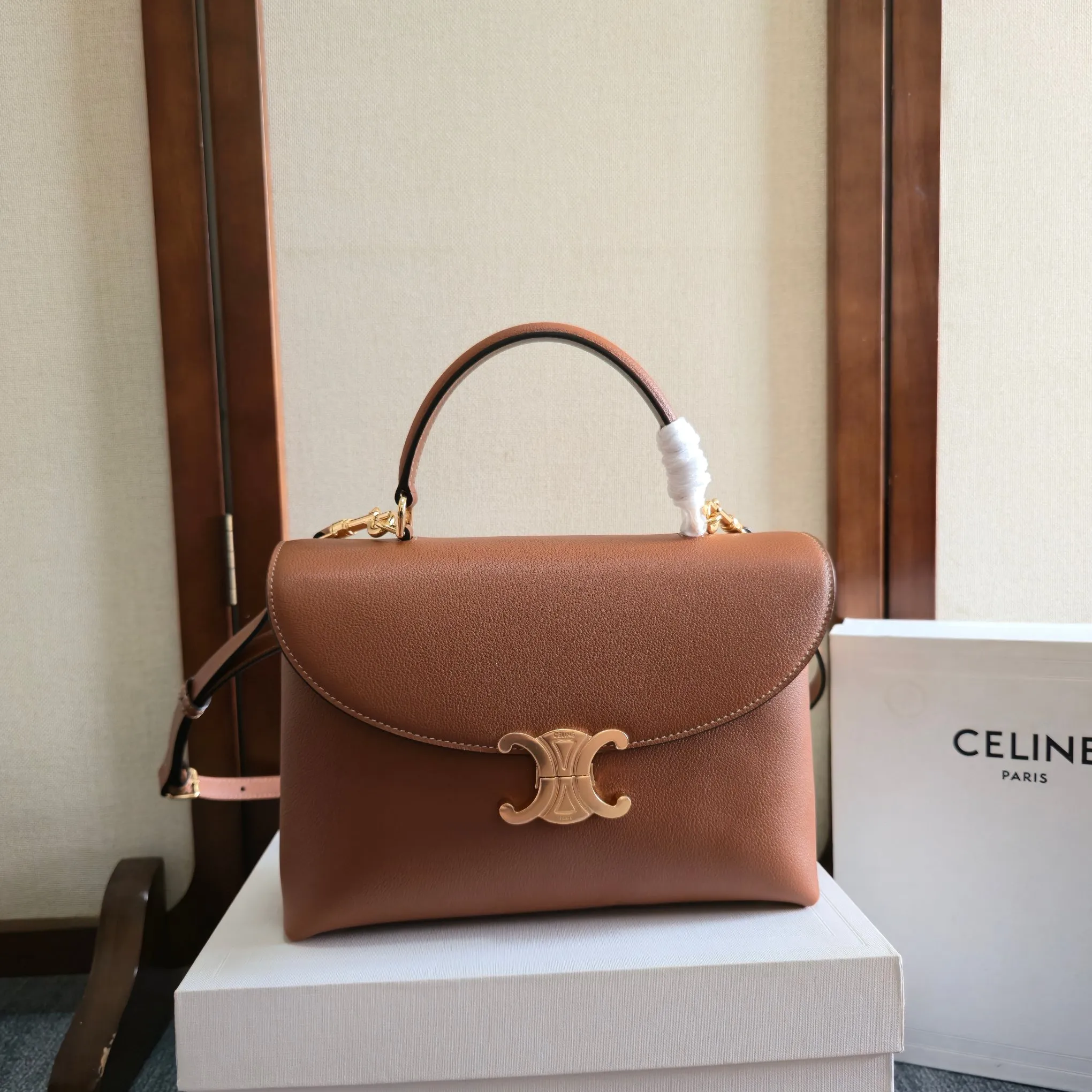Celine 1:1 premium Teen Besace Triomphe bag in Tan polished calfskin with gold-tone Triomphe metallic closure and boutique packaging - xiashuluxe