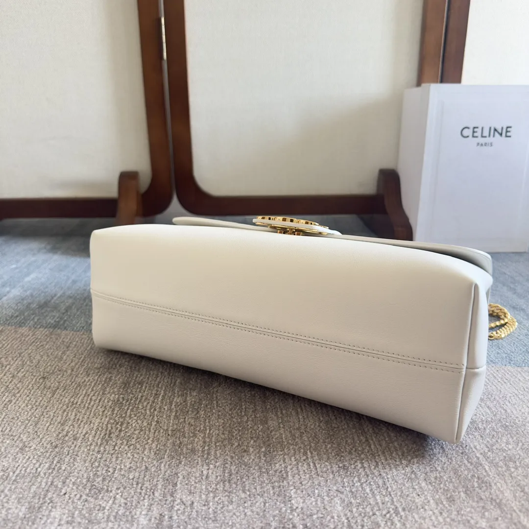 Front view of CELINE Medium Victoire Bag in white supple calfskin with gold Triomphe clasp and sliding chain strap