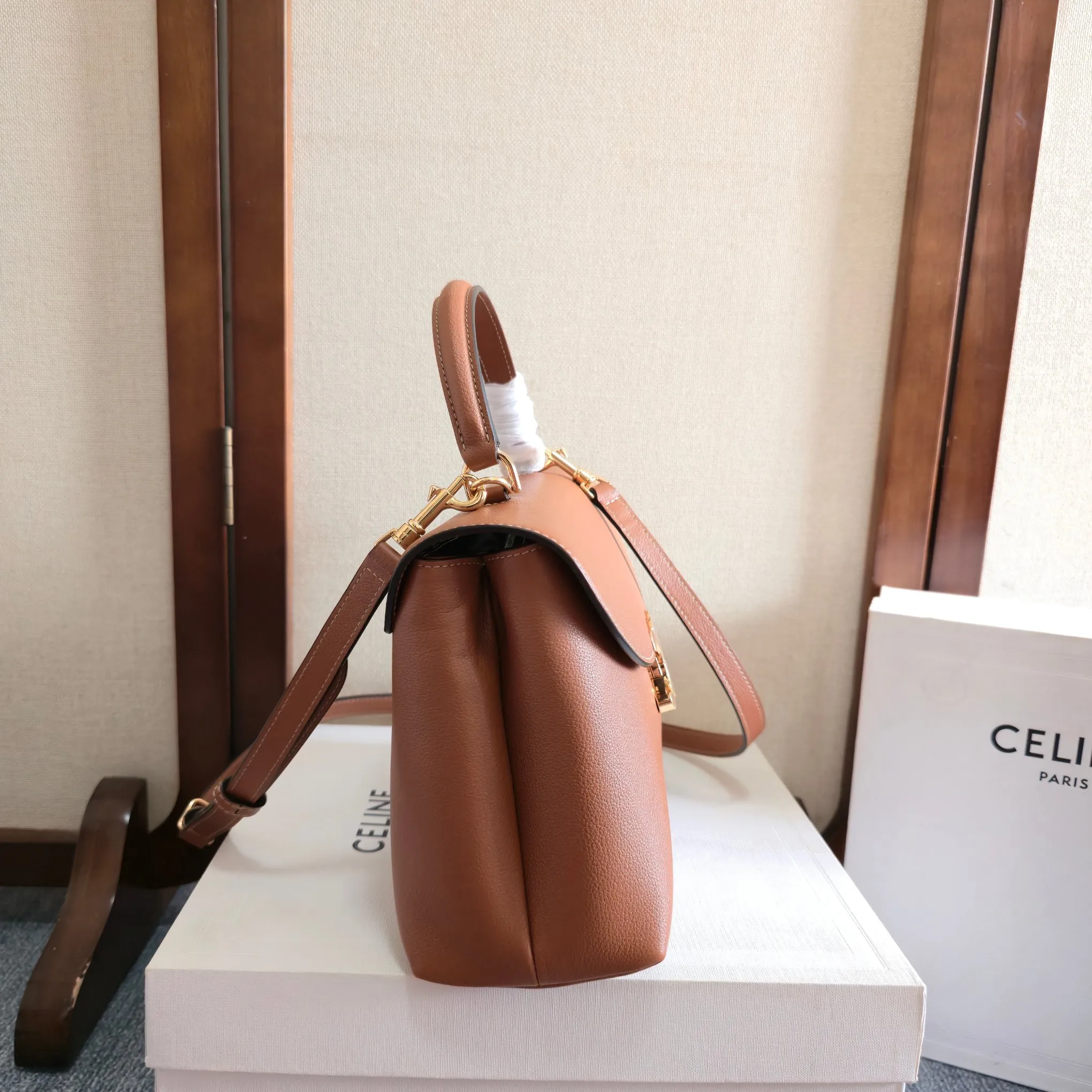 Celine 1:1 premium Teen Besace Triomphe bag in Tan polished calfskin with gold-tone Triomphe metallic closure and boutique packaging - xiashuluxe