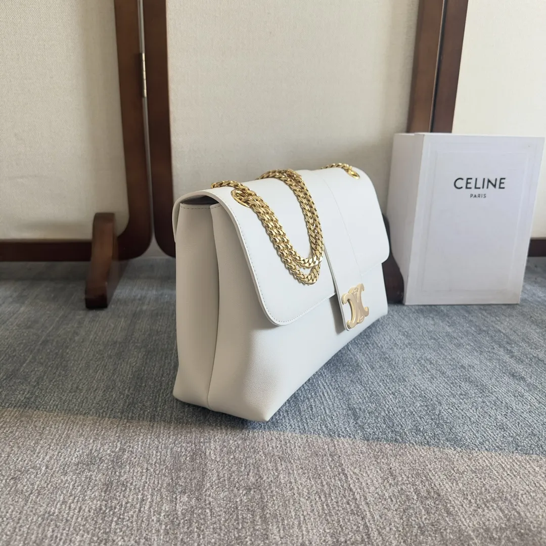 Front view of CELINE Medium Victoire Bag in white supple calfskin with gold Triomphe clasp and sliding chain strap