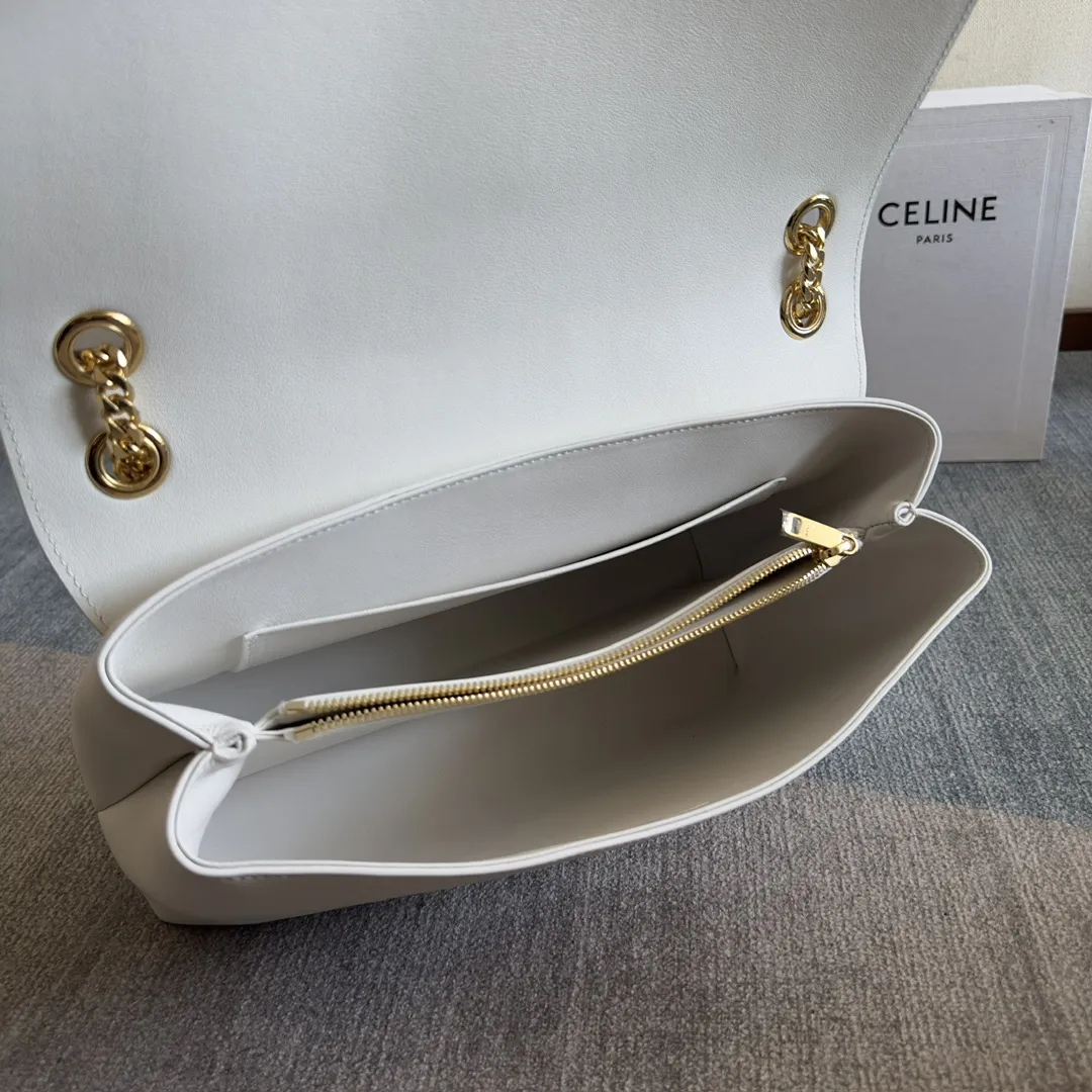 Front view of CELINE Medium Victoire Bag in white supple calfskin with gold Triomphe clasp and sliding chain strap