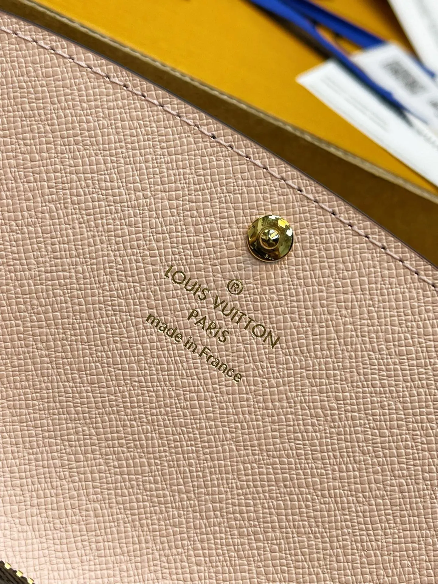 Side profile of slim LV Adele wallet M61289 premium leather craftsmanship