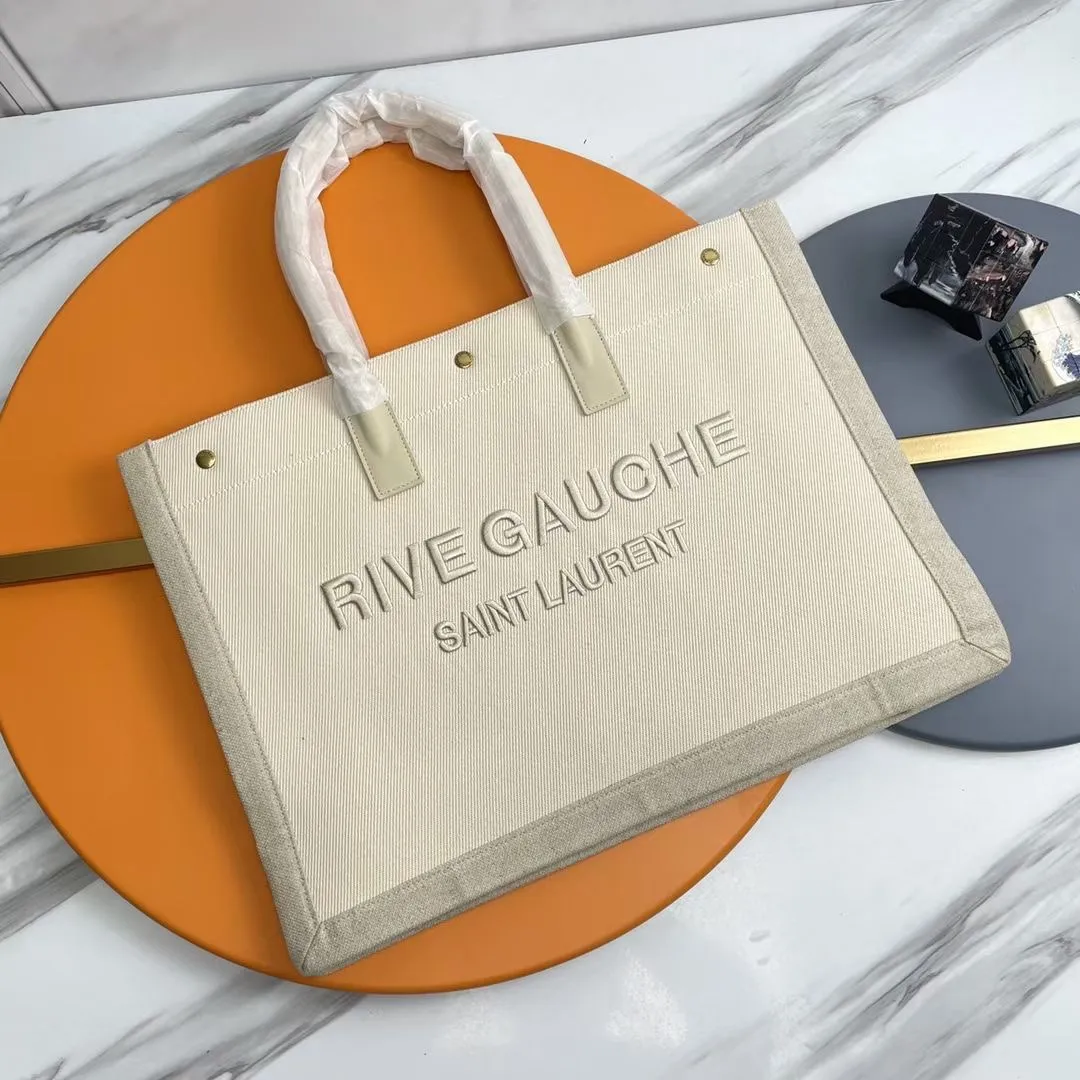 横款💰💰470_ Rive Gauche Tote Bag，左岸购物袋🛍️，从定制麻布料到五金在到丝印，每一个细节我都要求完美！zp购入开模定制，说真的，这是我遇到过最难做的一款购物袋了！托料极其复杂，经过反复试验才做到跟zp完全一样的手感！旅游出差必备时尚款！p 型号：509415.Zx 48x36x16cm：48x36x16cm