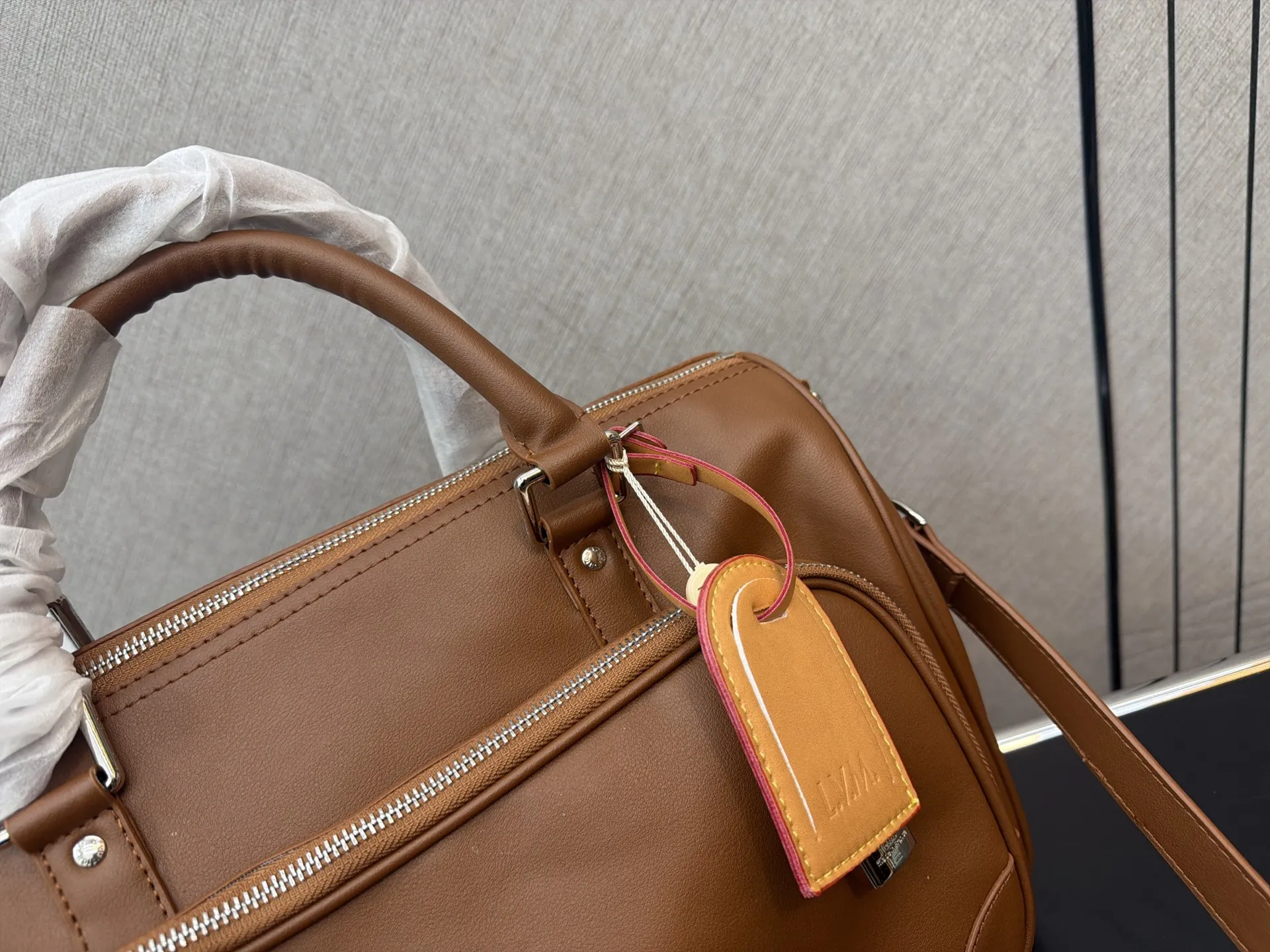 P170 Louisvuitton 路易威登 Lv keepall CARGO BANDOULI&Egrave;RE 35 银色金属配件品牌提花内饰 单肩斜挎手提包 旅行袋 实物拍摄 原厂面料 规格 35 x 22cm